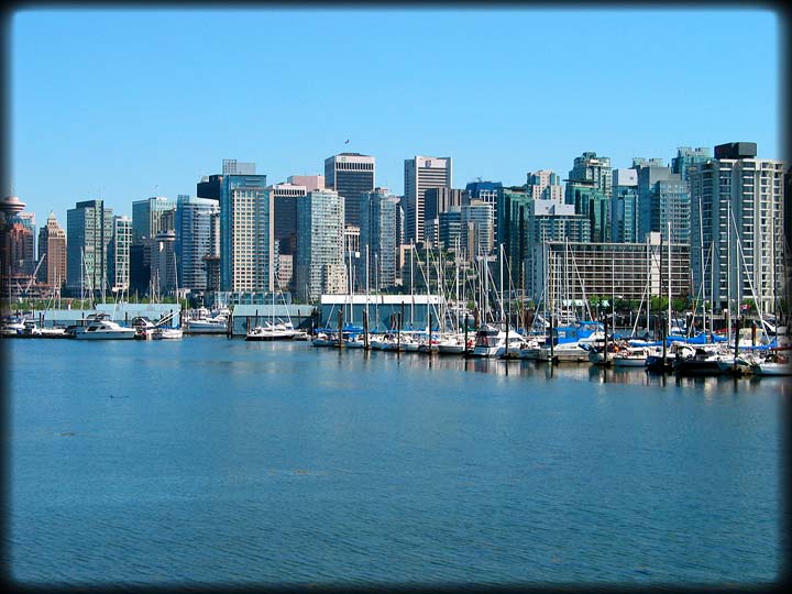 View Of Vancouver Across Coal Harbour In Stanley Park