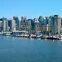 View Of Vancouver Across Coal Harbour In Stanley Park