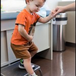Carrying his arm just as he did before his cast was removed