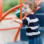 Smiling & waving at a parent at Bogan Park