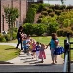 Heading to his class’s end-of-year party (4th from front)