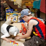 With Cousin Zach, playing with Mack & Lightning McQueen