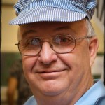 Grandpa sporting a conductor’s hat