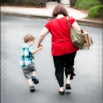 Walking with Mommy to his three-year checkup