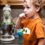 Making caterpillar cupcakes & sampling his work