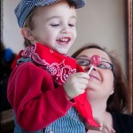 Our little engineer with his mama on a train at the Southeastern Railway Museum