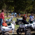 Riding the cow train with Mama