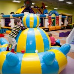 Enjoying the inflatable carousel at Catch Air