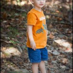 Standing on the bank of the Oconaluftee River in Cherokee
