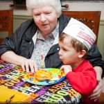 Helping Granny blow out her candle
