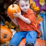 Listening to a pumpkin in the Christmas Village in Pigeon Forge