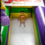 Mr “Rad Like Dad” takes on the big slide at Monkey Joe’s