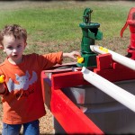 Playing with the rubber ducks at the pumps