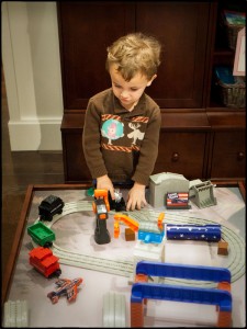 Playing with trains at Pottery Barn Kids at Lenox Square